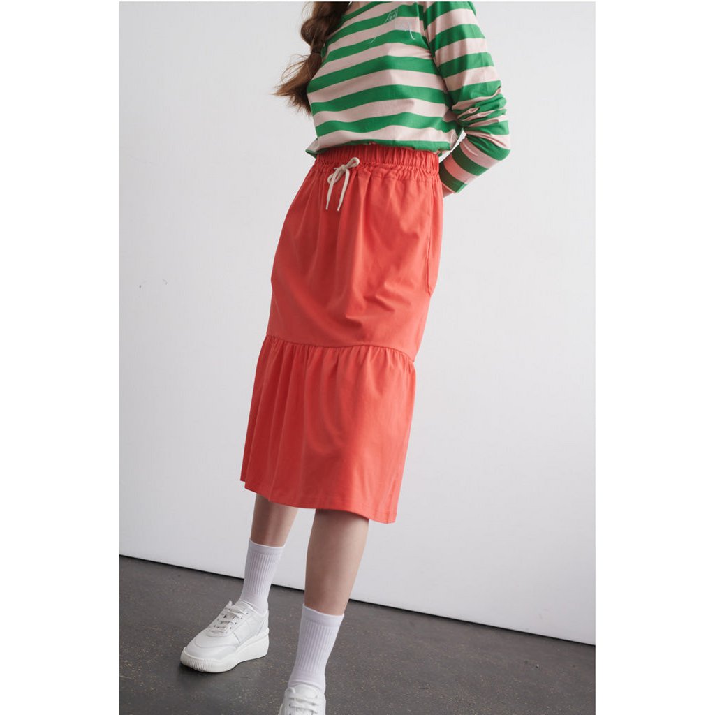 Paarse rok in rood voor dames